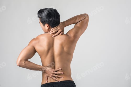 Preview: Close Up Of Man Rubbing His Painful Back Isolated On White Background.