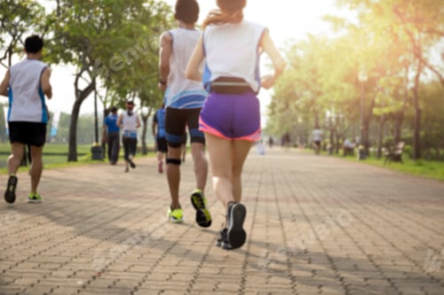 Preview: Blurred Concept Group Of People Running In The Park In The Morning