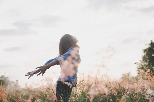 Preview: Young Beautiful Woman Standing Stretch Her Arms In The Air On The Grass Field. Woman Enjoy With