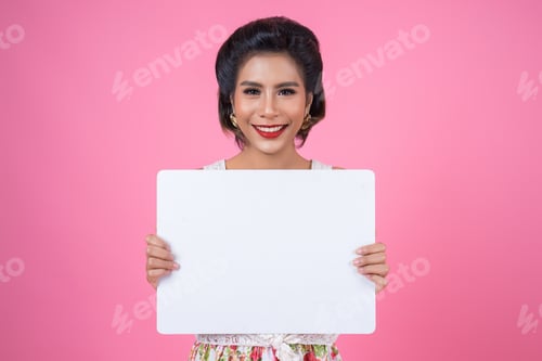 Preview: Smiling Woman Holds a Blank Sign on Pink