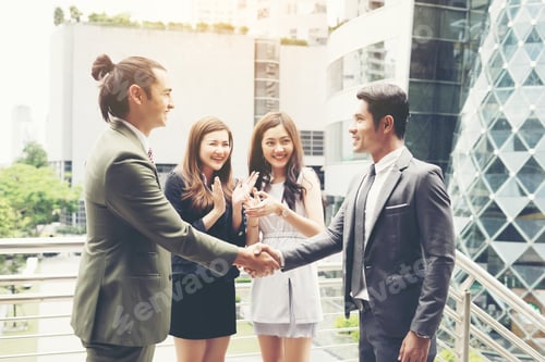 Preview: Business People Shaking Hands, Finishing Up A Meeting Success Deal.