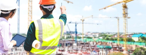 Preview: Male Engineer And Female Engineer Are Talking And Designing The Building At The Construction Site.