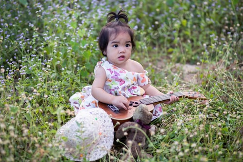 Preview: Cute Girl Smiling Brightly In The Setting Sun