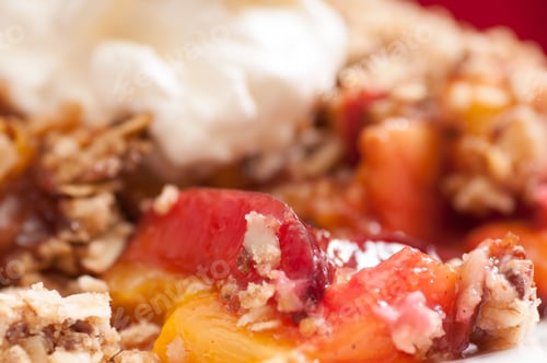 Preview: A Closeup Shot Of Home Made Plum And Peach Crumble Or Cobbler With Whipped Cream