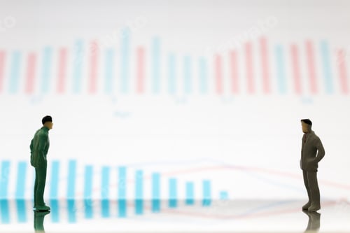 Preview: Miniature Figures Businessman Standing On A Graph Chart