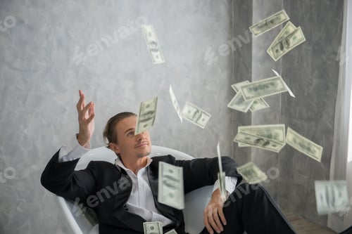 Preview: Rich Businessman Lying In Bathtub Filled With Dollar Banknotes. Success Business Concept.