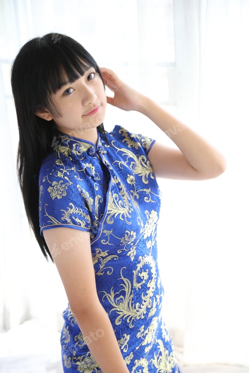 Preview: Beauty Woman Wear Red Cheongsam Looking And Smile In Chinese New Year