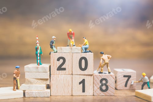 Preview: Miniature People : Worker Team Building Wooden Block Number 2018 On Wooden Background