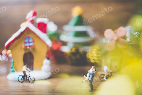 Preview: Miniature People In The Village Celebrate Christmas Day , Holiday Concept.