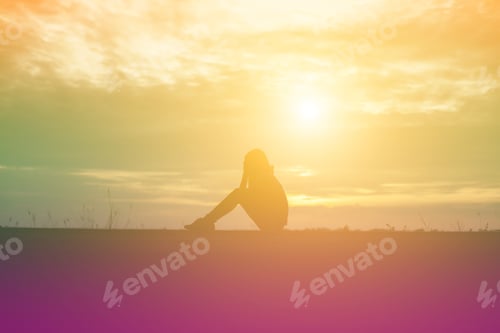 Preview: Sad And Depressed Woman Sitting Alone