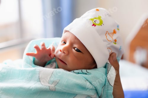 Preview: Newborn Baby Looking At The Camera