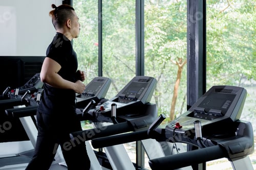 Preview: Healthy Man Running On Treadmill.