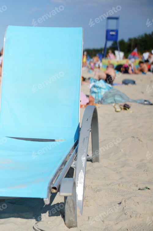 Preview: A Vertical Shot Of A Blue Sunbed At The Beach Of Ustka In Poland