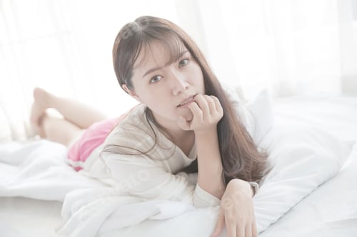 Preview: Asian Young Woman Wake Up On Bed In White Tone