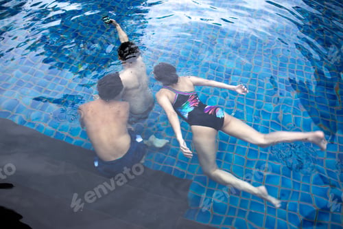 Preview: Group Of Friends Taking Selfie Under The Water In Swimming Pool Resort With Waterproof Cell Phone