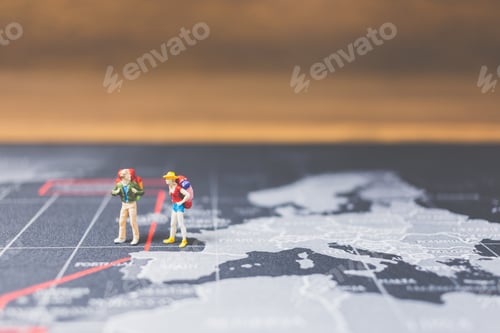 Preview: Miniature People Backpacker Walking On World Map, Tourism And Travel Concept