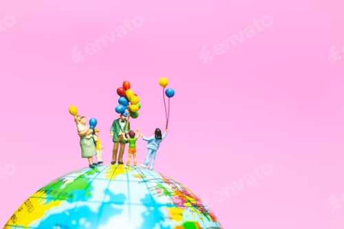Preview: Miniature People : Happy Family Holding Balloon On The Globe With Pink Background And Copy Space