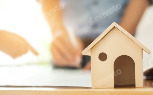 Preview: Real Estate Concept, Image Of Toy Wooden House Over Blurred Engineer Working Background