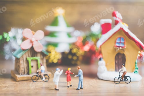 Preview: Miniature People In The Village Celebrate Christmas Day , Holiday Concept.