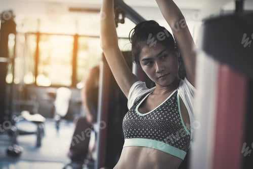 Preview: Fitness Woman Doing Exercises And Warm Up At Gym ; Healthy Lifestyle