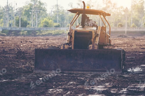 Preview: Grader Leveling Landfill On Construction Site Before Kick Off Project