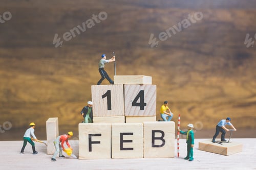 Preview: Miniature People : Worker Team Building Word " 14 Feb " On Wooden Block With Wooden Background