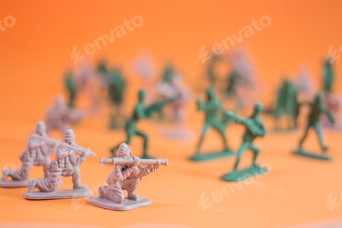 Preview: Closeup Of Action Mini Toy Soldier On Orange Background