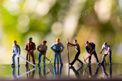 Preview: Miniature People Worker Holding Tool Outdoors With Green Bokeh Background , Construction Concept