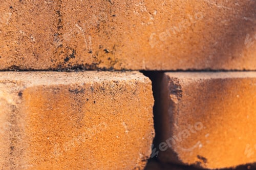 Preview: A Closeup Shot Of A Small Hole On A Brick Wall