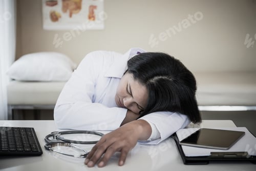 Preview: Overworked Medical Staff Sleep On Her Workplace.