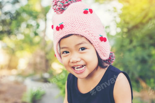 Preview: Little Cute Asian Girl Standing Among The Purple Flower Field Sunshine Day. Freedom Enjoying With