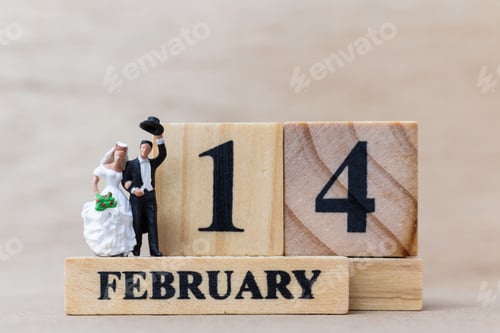 Preview: Miniature People Couple With Wooden Block 14 Feb On Wooden Background, Happy Valentines Day Concept