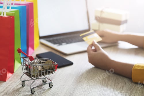 Preview: Woman Using Credit Card Shopping Online With Mobile Smartphone