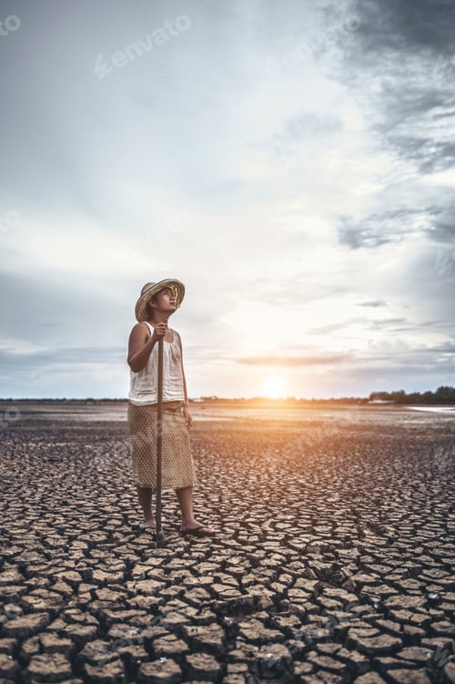 Preview: The Woman Stand His Hand And Caught A Siem On Dry Soil And Looked At The Sky.
