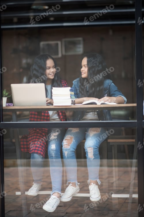 Preview: Group Of Happy Friends Student Talking About Knowledge In Cafe