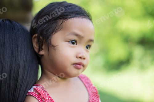 Preview: Mother Holding Her Daughter