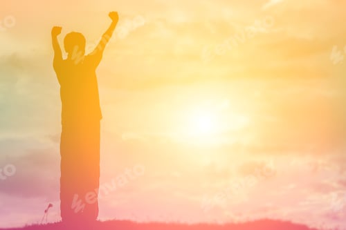 Preview: Silhouette Of Woman Praying Over Beautiful Sky Background