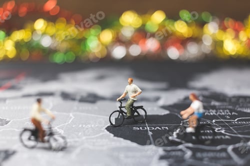 Preview: Miniature People Travelers Riding Bicycle On World Map , Traveling And Exploring The World Concept