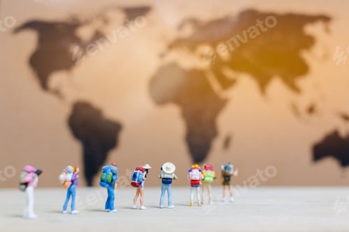 Preview: Miniature People Travelers Walking On World Map , Traveling And Exploring The World Concept