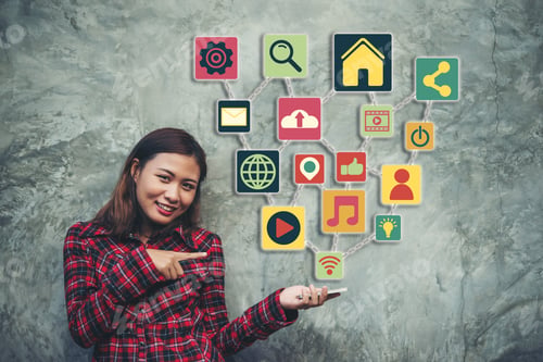 Preview: Young Woman Presenting At Modern Smartphone With Social Media Icons.