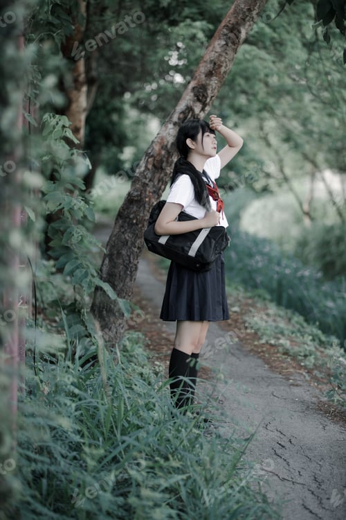 Preview: Portrait Of Asian Japanese School Girl Costume Looking At Park Outdoor Film Vintage Style