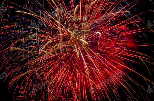 Preview: Bright Festive Fireworks Light Rays On A Dark Sky Background