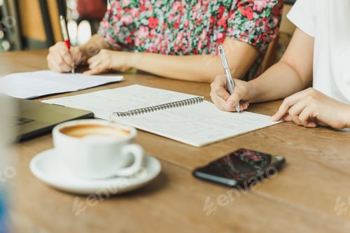 Preview: Business Woman Hands Writing On Notebook Documents.