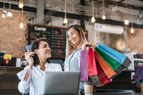 Preview: Young Women Enjoy Shopping With Credit Cards.