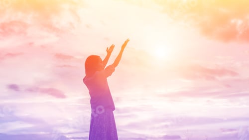 Preview: Silhouette Of Woman Praying Over Beautiful Sky Background