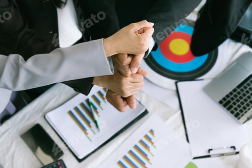 Preview: Business Team Stacking Hands