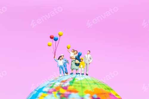 Preview: Miniature People : Happy Family Holding Balloon On The Globe With Pink Background And Copy Space