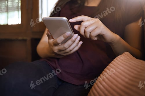 Preview: Young Woman Searching A Job In Website On Mobile Smart Phone