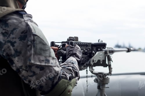 Preview: Selected Focus Navy Soldier Hand On Machine Gun On Navy Ship