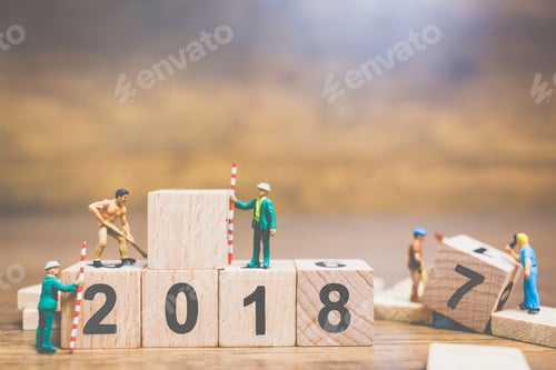 Preview: Miniature People : Worker Team Building Wooden Block Number 2018 On Wooden Background